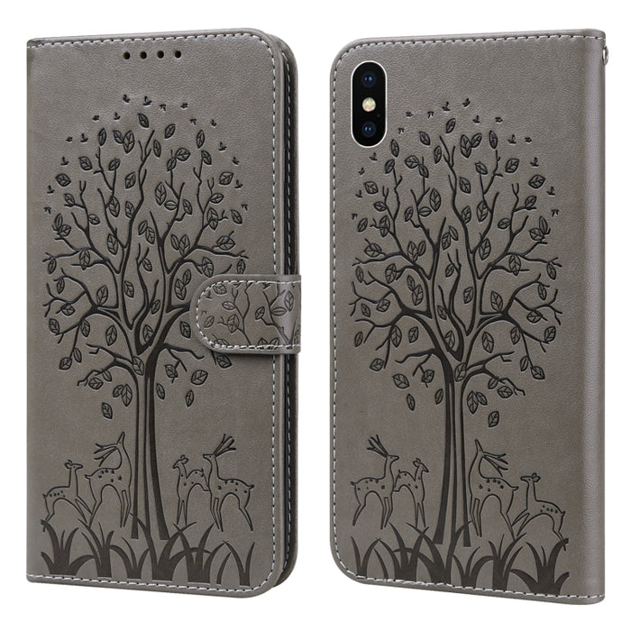 Estuche para teléfono de cuero con tapa horizontal estampado prensado con estampado de árboles y ciervos