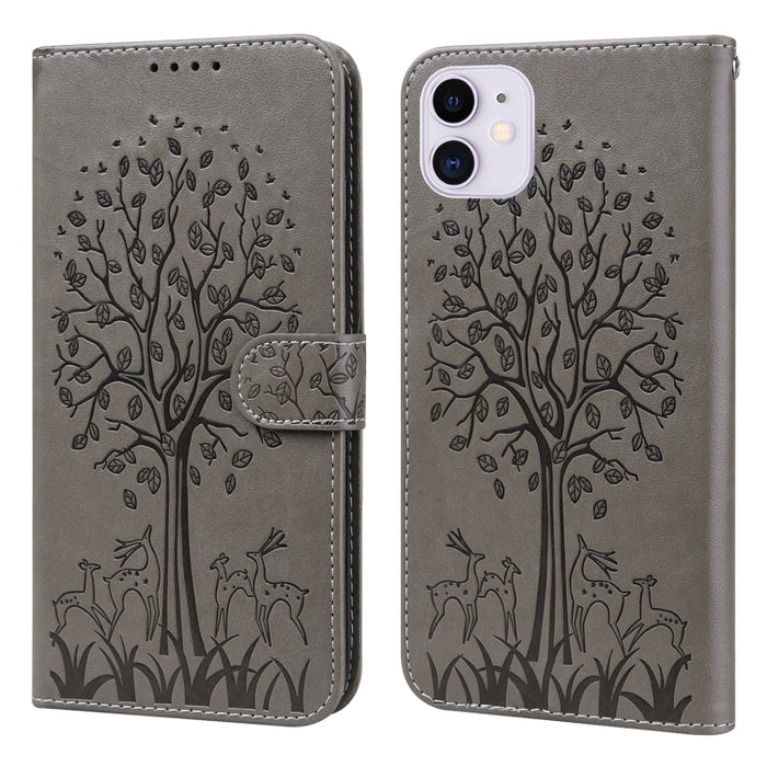Estuche para teléfono de cuero con tapa horizontal estampado prensado con estampado de árboles y ciervos