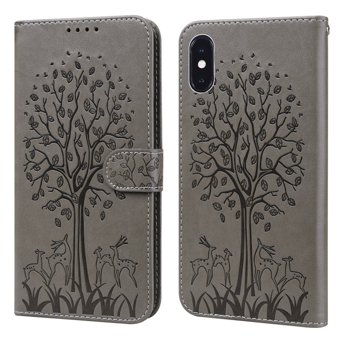 Estuche para teléfono de cuero con tapa horizontal estampado prensado con estampado de árboles y ciervos