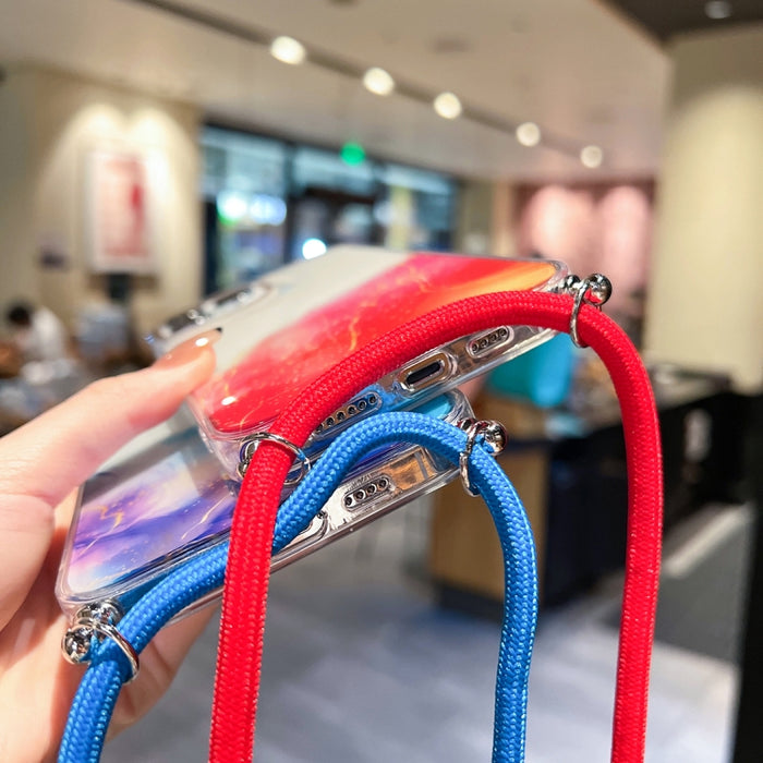 Estuche para teléfono con cordón dorado con diseño de mármol y halo