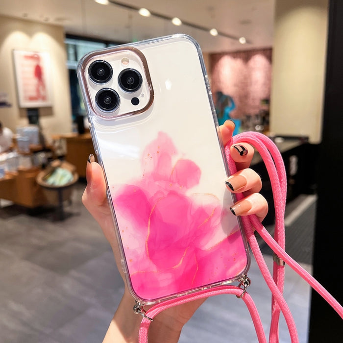 Estuche para teléfono con cordón dorado con diseño de mármol y halo