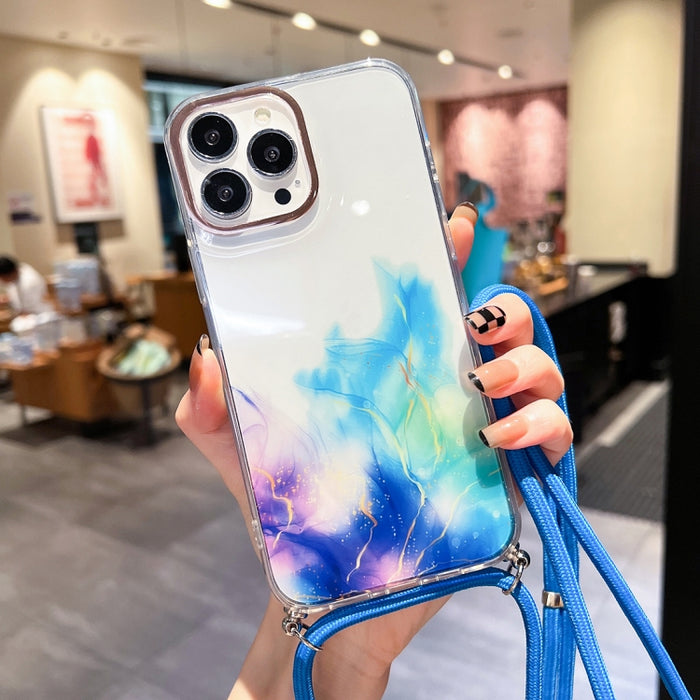Estuche para teléfono con cordón dorado con diseño de mármol y halo