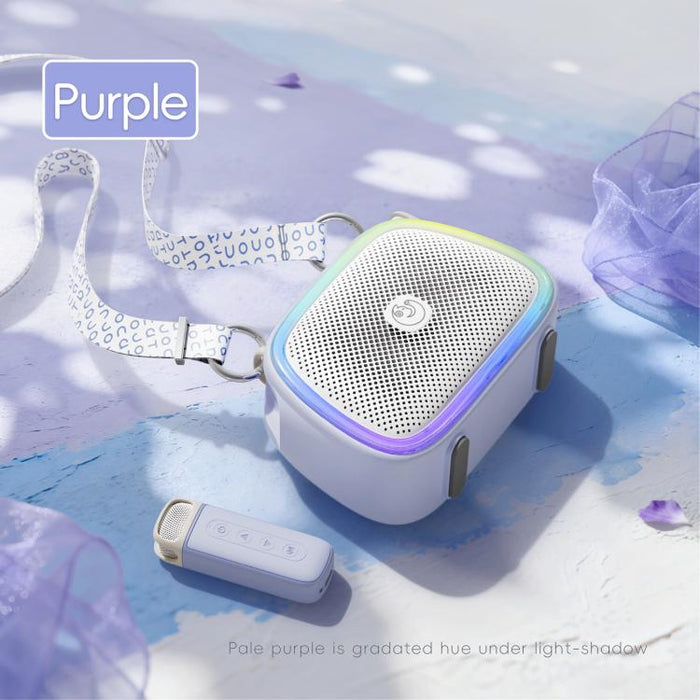 Altavoz inalámbrico portátil para karaoke C22 con micrófono y correa para el hombro.