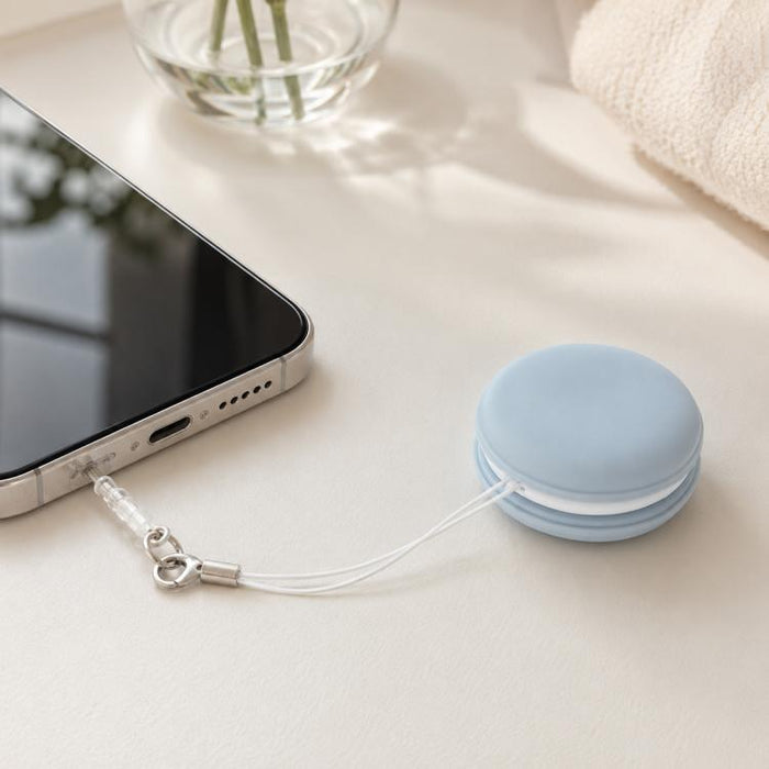 Paño limpiador de pantallas de teléfono multifuncional portátil con forma de macaron y cordón.