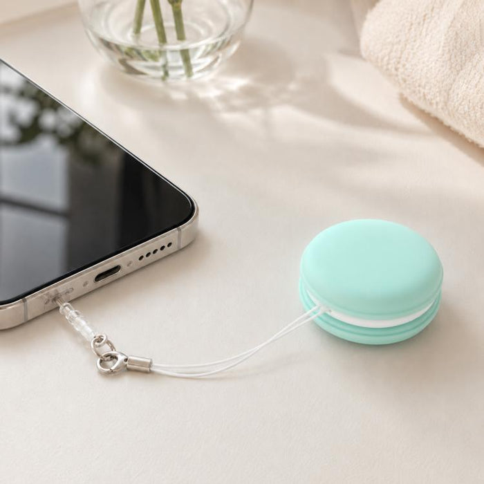 Paño limpiador de pantallas de teléfono multifuncional portátil con forma de macaron y cordón.