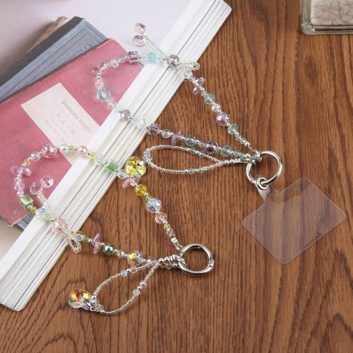 Pulsera con colgante de teléfono con cuentas y almohadilla de sujeción para mujeres y niñas.