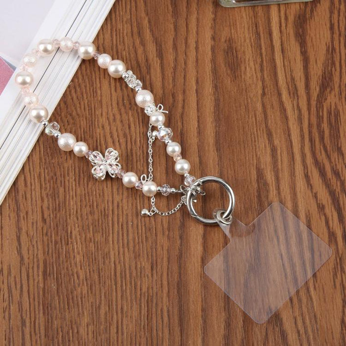 Pulsera con colgante de trébol de cuatro hojas, borla y cuentas, con almohadilla de sujeción para mujer y niña.