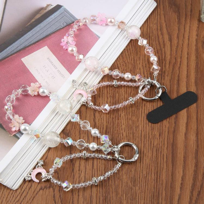 Correa de muñeca corta con colgante de luna creciente y cuentas, con almohadilla de sujeción para mujeres y niñas.