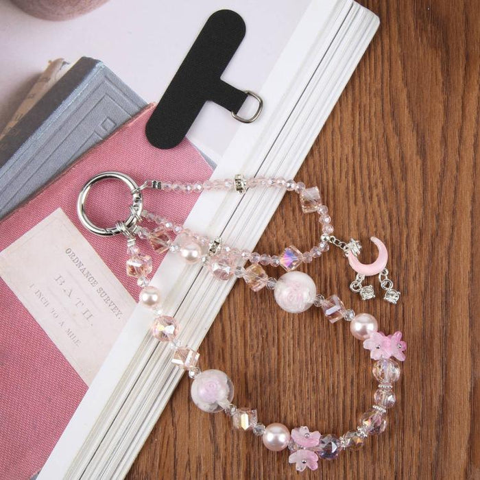 Correa de muñeca corta con colgante de luna creciente y cuentas, con almohadilla de sujeción para mujeres y niñas.
