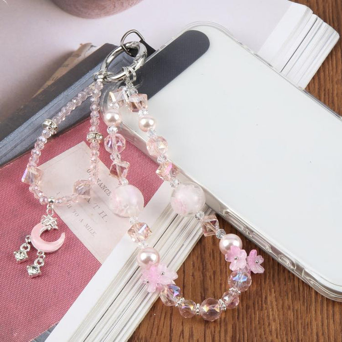 Correa de muñeca corta con colgante de luna creciente y cuentas, con almohadilla de sujeción para mujeres y niñas.