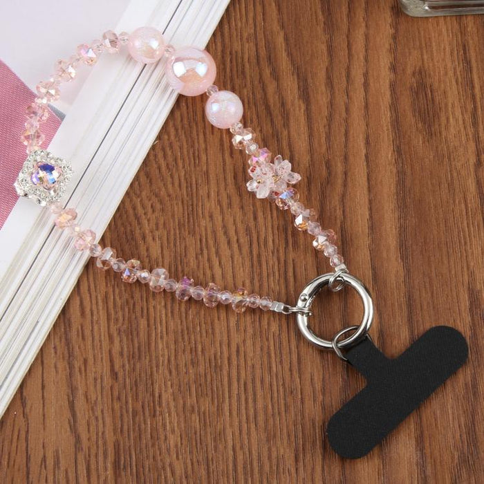 Pulsera con colgante de trébol de cuatro hojas y almohadilla de sujeción para mujer y niña.