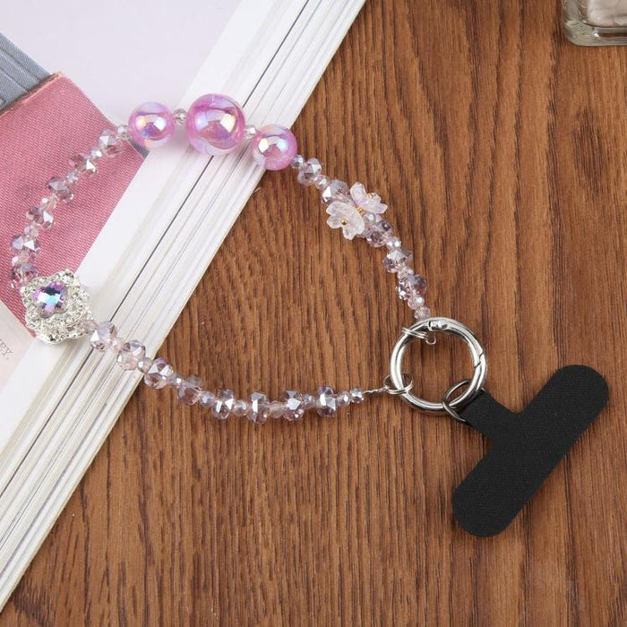 Pulsera con colgante de trébol de cuatro hojas y almohadilla de sujeción para mujer y niña.