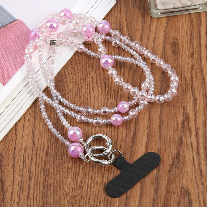 Colgante para teléfono con cadena de cuentas y lazo, con almohadilla de sujeción para mujeres y niñas.