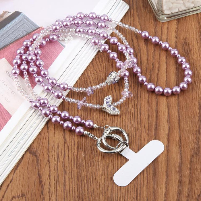 Colgante para teléfono con cadena de cuentas en forma de cola de pez y almohadilla de sujeción para mujeres y niñas.