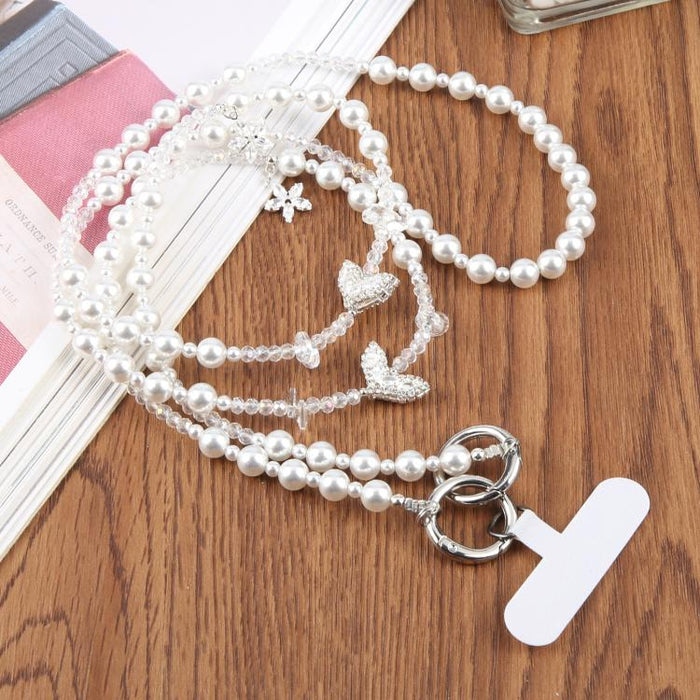 Colgante para teléfono con cadena de cuentas en forma de cola de pez y almohadilla de sujeción para mujeres y niñas.