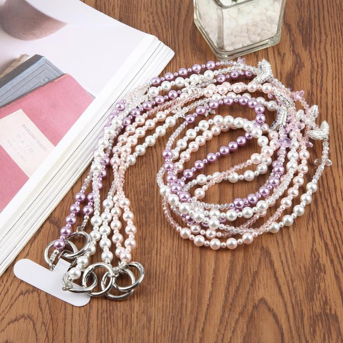 Colgante para teléfono con cadena de cuentas en forma de cola de pez y almohadilla de sujeción para mujeres y niñas.