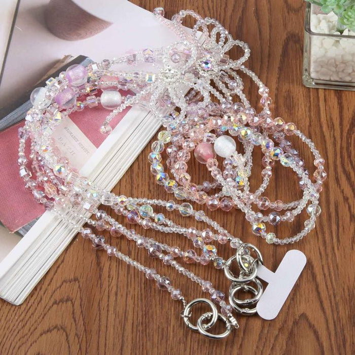 Correa para teléfono con cordón cruzado y lazo de cuentas