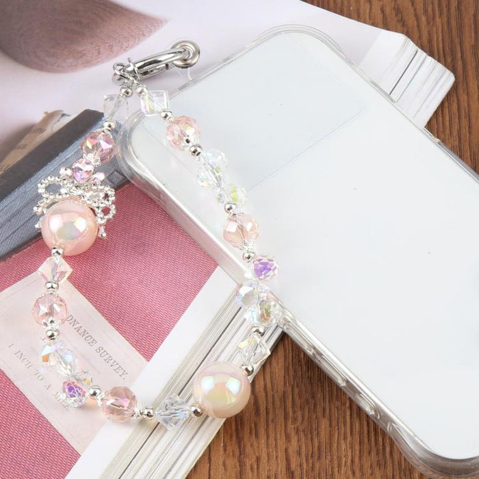 Pulsera con colgante de teléfono y cordón de sujeción con cuentas de burbujas de camelia para mujeres y niñas.
