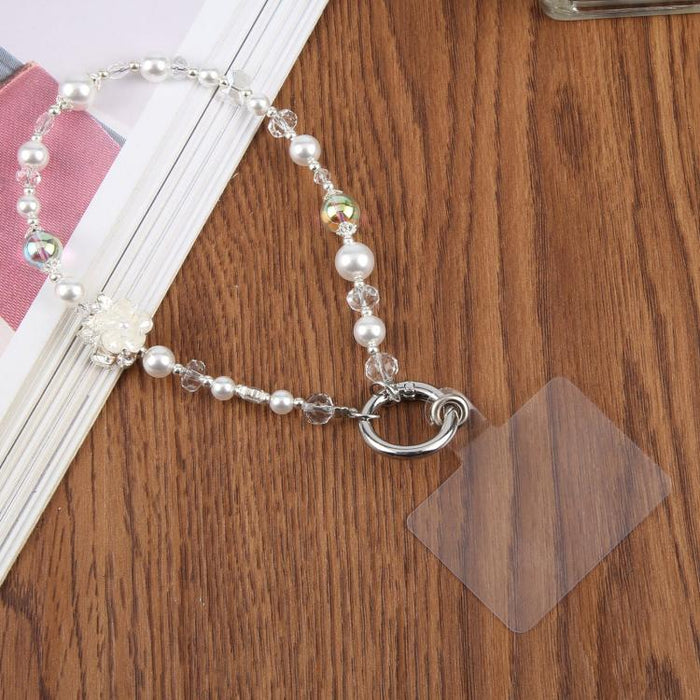 Cadena corta de cuentas con colgante para teléfono y correa de muñeca con almohadilla de sujeción para mujeres y niñas.