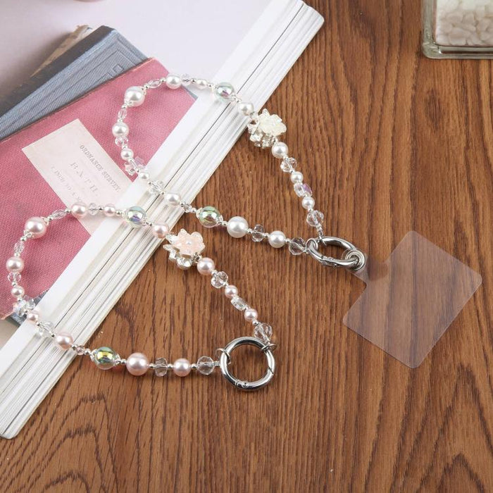 Cadena corta de cuentas con colgante para teléfono y correa de muñeca con almohadilla de sujeción para mujeres y niñas.