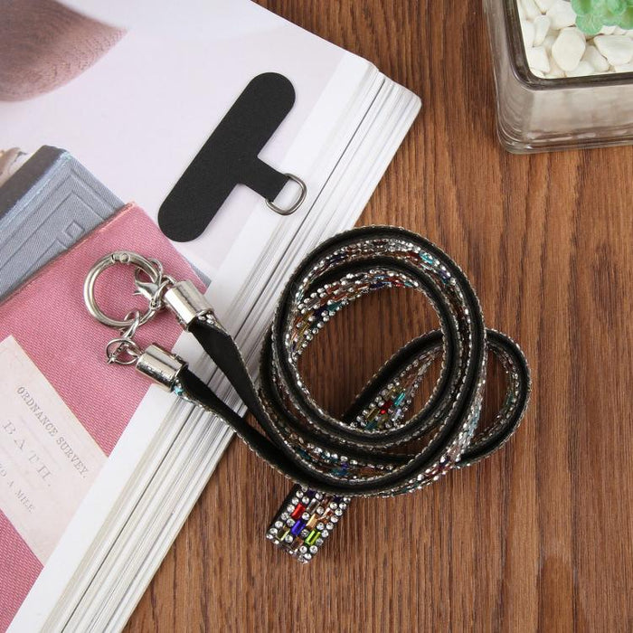 Cordón para teléfono con diamantes de imitación brillantes y almohadilla