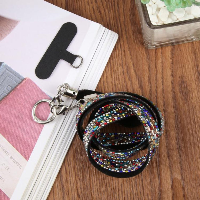 Cordón para teléfono con diamantes de imitación brillantes y almohadilla