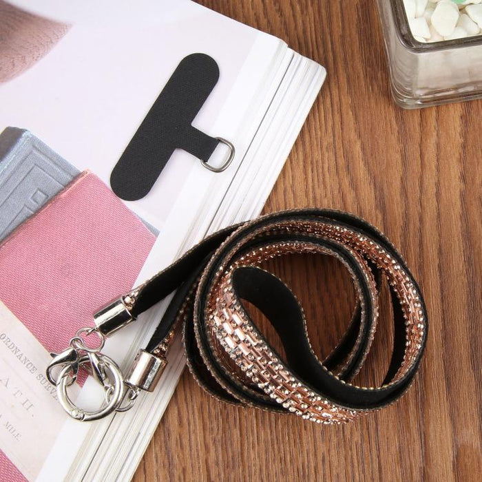 Cordón para teléfono con diamantes de imitación brillantes y almohadilla