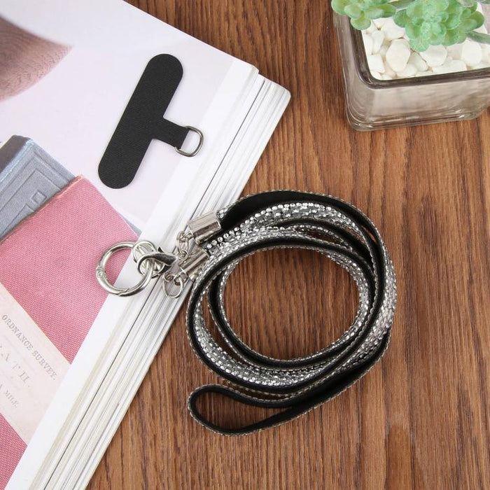 Cordón para teléfono con diamantes de imitación brillantes y almohadilla