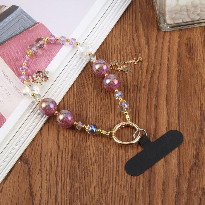 Pulsera con colgante de flores coloridas y cuentas, con almohadilla de sujeción para mujeres y niñas.