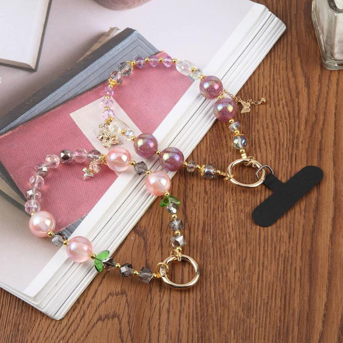 Pulsera con colgante de flores coloridas y cuentas, con almohadilla de sujeción para mujeres y niñas.
