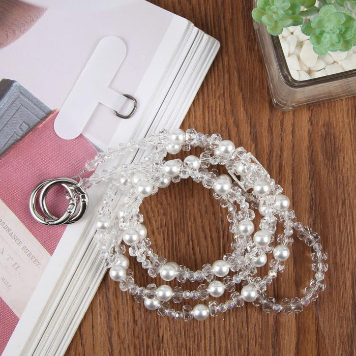 Colgante para teléfono con forma de frasco de perfume y cuentas, con cordón cruzado y almohadilla de sujeción.