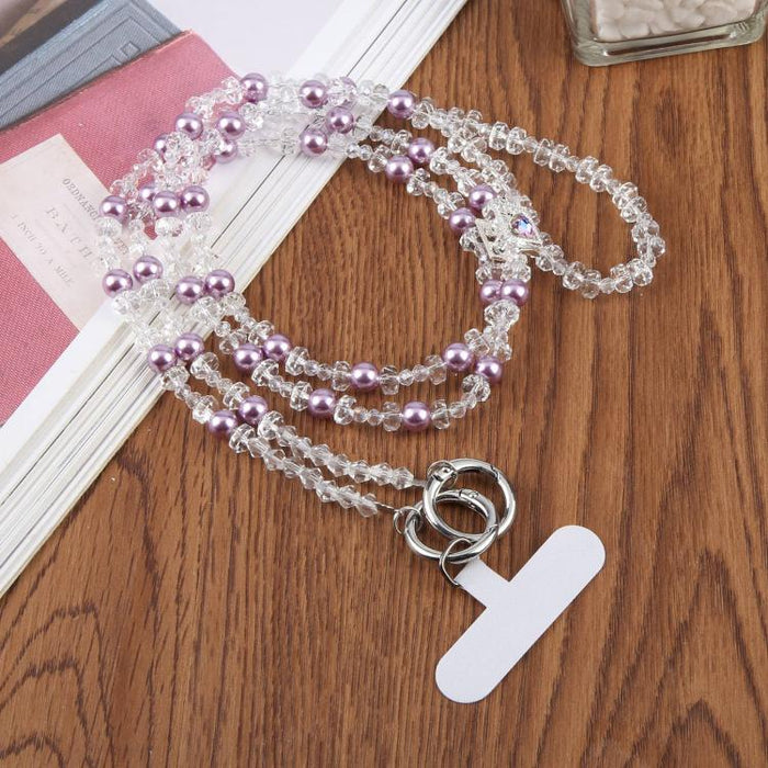 Colgante para teléfono con forma de frasco de perfume y cuentas, con cordón cruzado y almohadilla de sujeción.