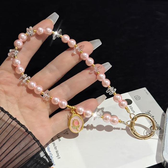 Cadena para teléfono con etiqueta de aleación delicada y perlas
