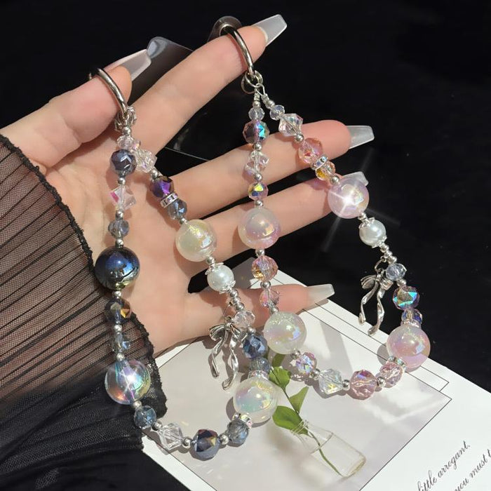 Elegante cadena de perlas y cristales con detalle de lazo de aleación dorada