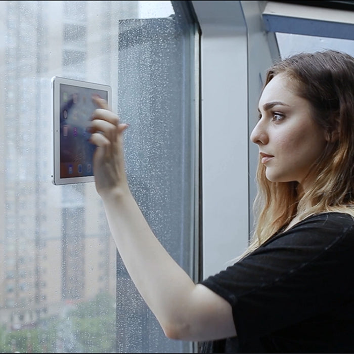 Soporte de pared para teléfono móvil con pegatina universal de adsorción magnética para iPad montado en la pared